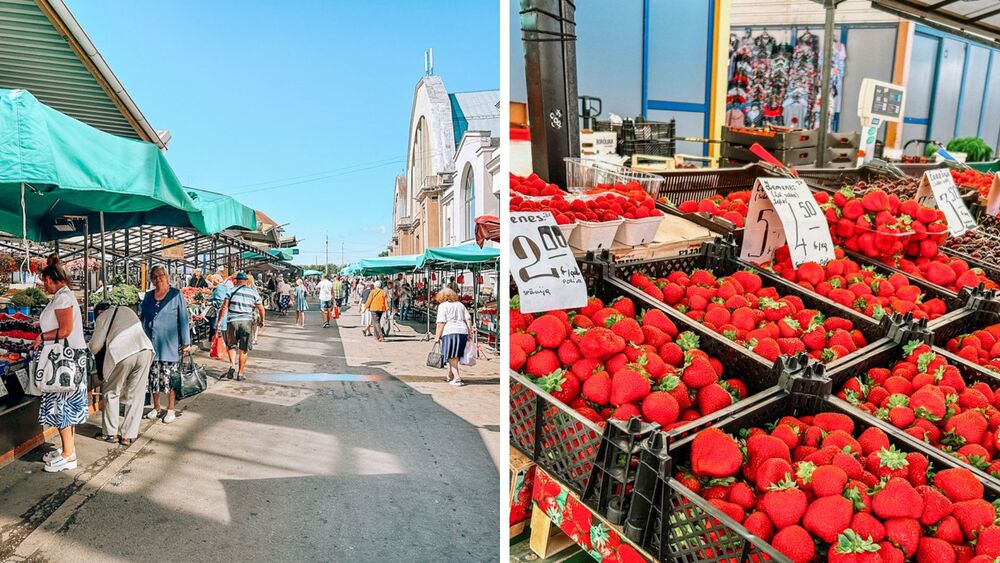 Vista del mercato centrale, nello sfondo l'ex hangar per la costruzione di dirigibili e cassette di fragole appena raccolte esposte al mercato